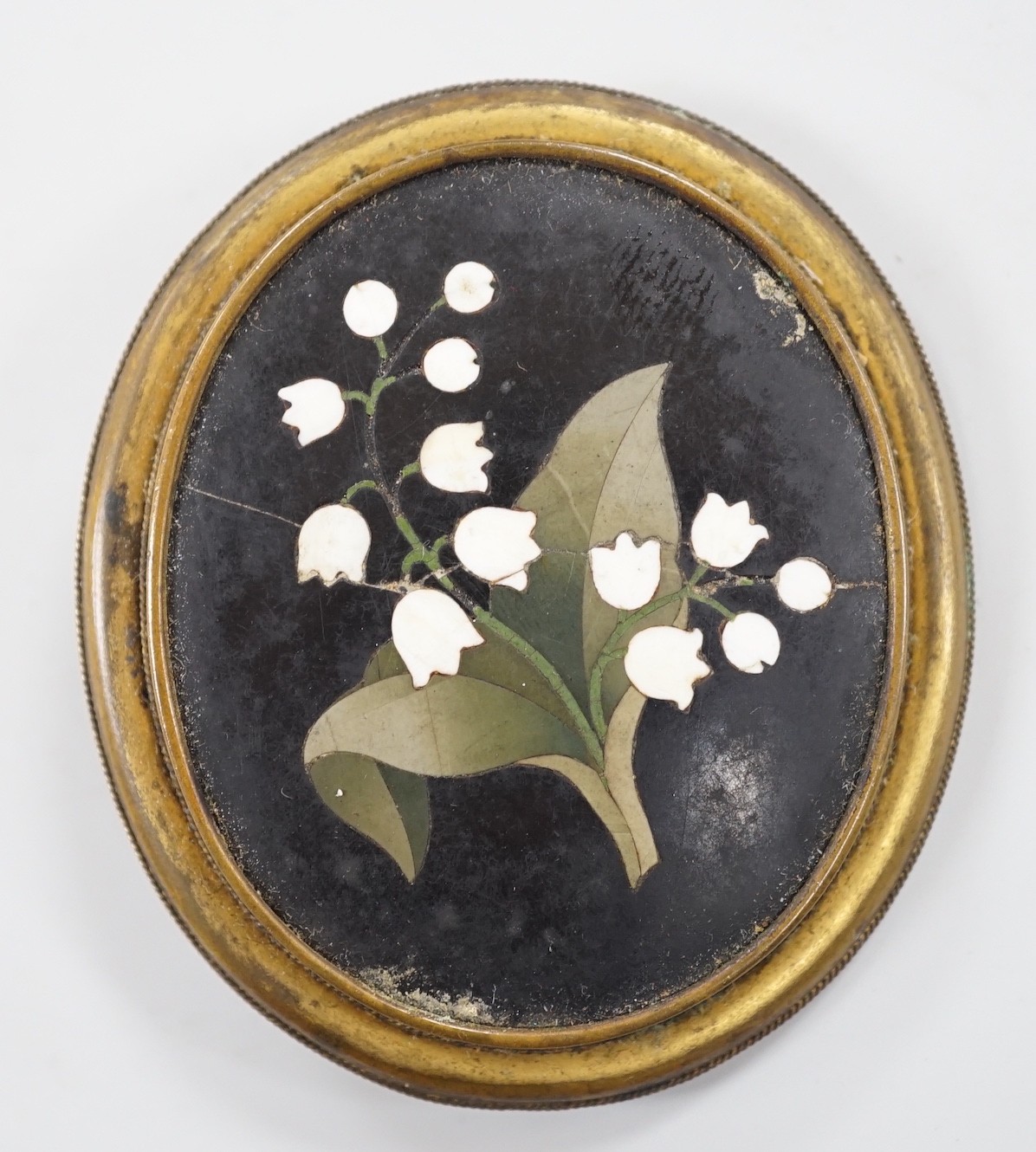 A gilt metal and Pietra Dura set oval brooch, 60mm.